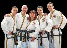 Martial Arts Family with their Black Belts